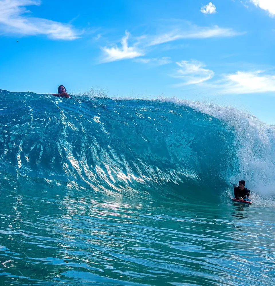 Surf riders photographed by Salty Shots Hawaii